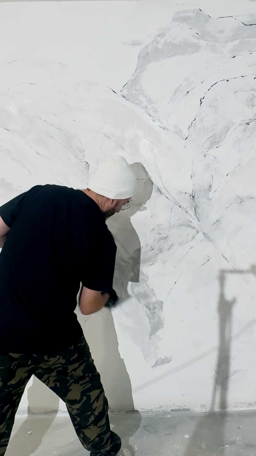 The same marble finish being burnished to completion